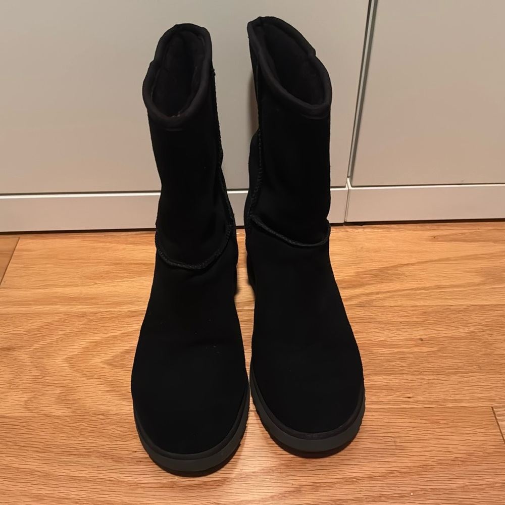 Wedged black UGG boots, slightly worn but in good condition. Size 9.5